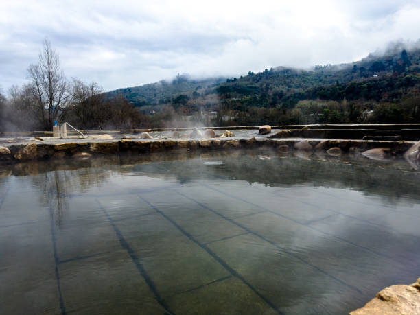 istock Steaming Outdoor Hot Spring with Mountain View 2166915114