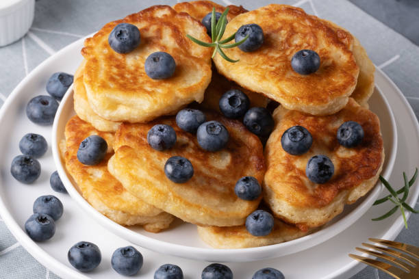 istock Homemade mini pancakes with blueberries 2166924593