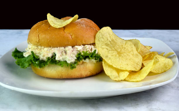 istock chicken salad on a bulkie roll  served with potato chips 2166925571