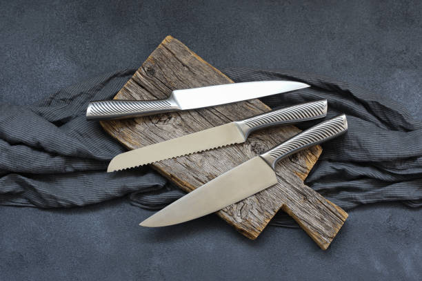 Casting steel various chef knife, Set of modern sharp kitchen knives on dark background