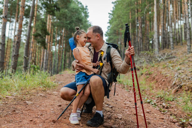 istock The daughter and father walking on nature 2166926093