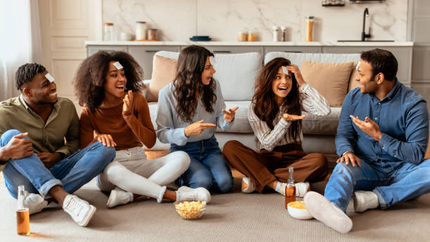 istock Friends engaged in animated discussion at home 2166928218