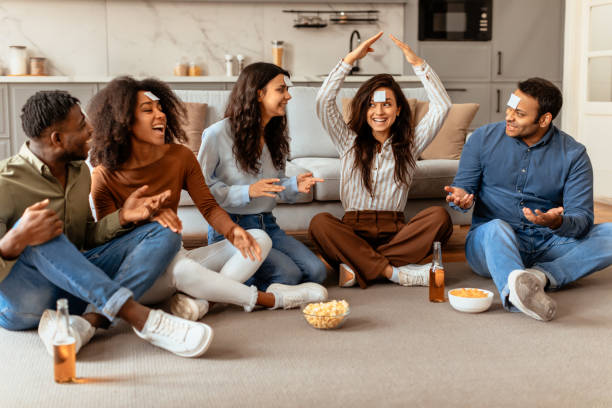 istock Friends having a conversation with drinks, have home party 2166928274