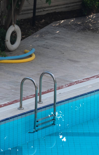 istock Swimming pool with stair and water. 2166932261