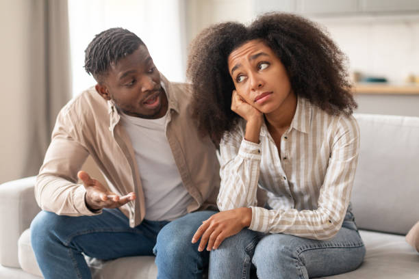 istock Unhappy millennial black couple arguing facing relationship issues at home 2166932497