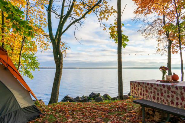Campsite by the lake on an autumn morning