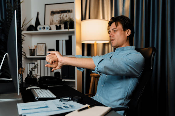 istock Sales manager working with stretching manner in working at night. Pecuniary. 2166934438