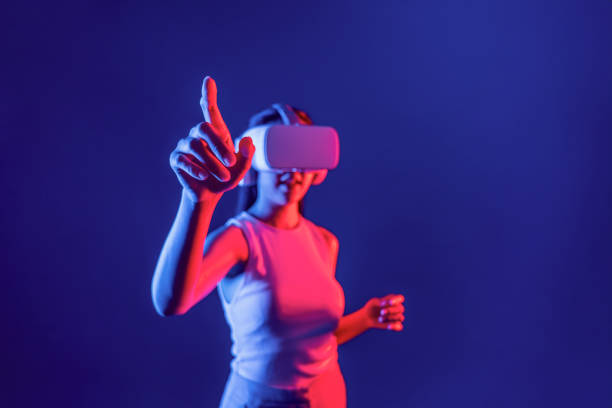 istock Elegant female connect metaverse use finger point virtual object. Hallucination. 2166935248