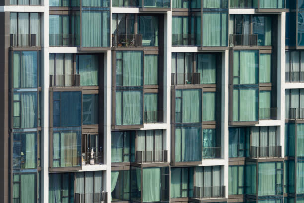 istock Window building apartment. Modern city skyscraper in day light. Ornamented. 2166936327