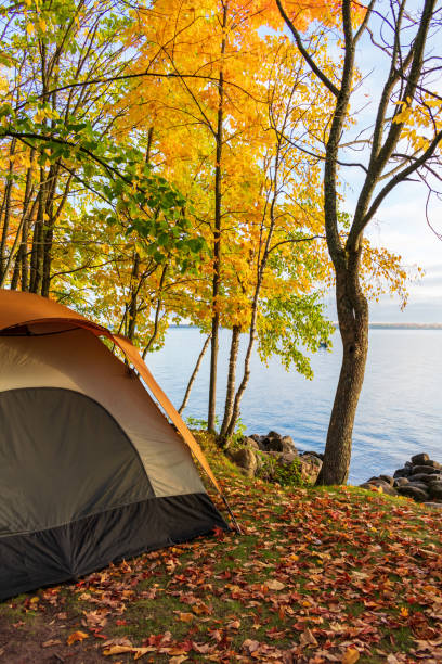 istock Tent beside a lake in autumn 2166936673