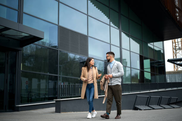 istock Business people walking and talking 2166936692