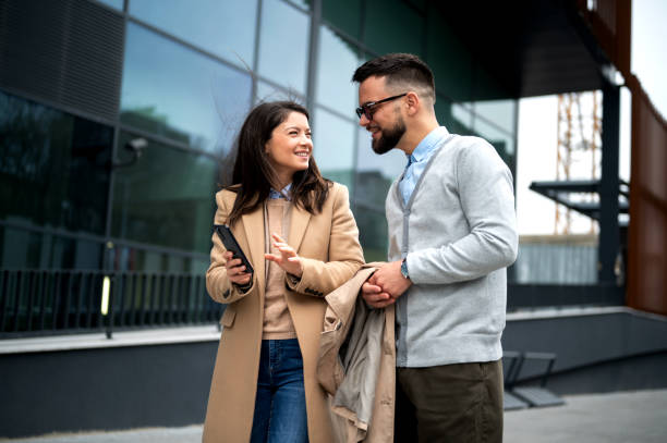 istock Business people walking and talking 2166936740