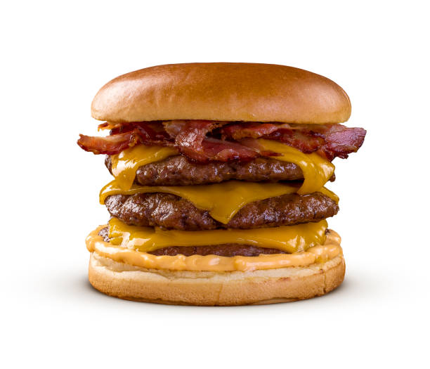 Triple Bacon Cheeseburger isolated on white background.