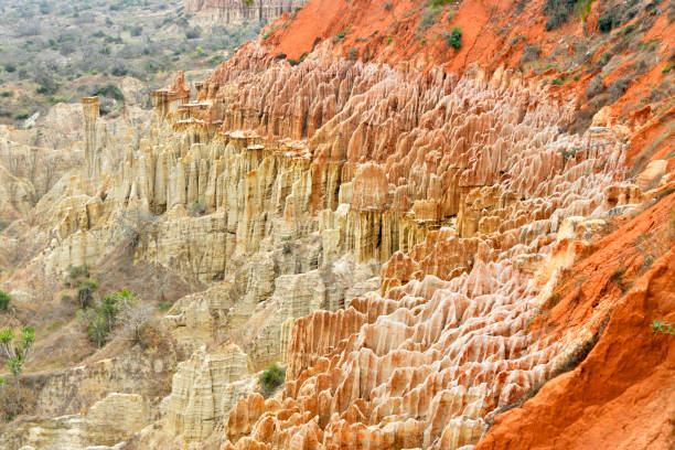 Belas , Luanda Province, Angola: The Miradouro da Lua, or Moon Viewpoint, is Angola's Bryce Canyon, a natural wonder located about 40 kilometers south of Luanda. This unique geological formation has been sculpted over countless years by the relentless forces of wind and rain, resulting in an otherworldly landscape reminiscent of the lunar surface. Its stark beauty, characterized by sharp ravines, wering cliffs, deep crevices, and smooth, white rock formations, has earned it a well-deserved reputation as one of Angola's most iconic attractions.