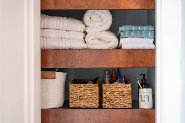 istock Floating shelves in a neatly organized bathroom closet 2166941572
