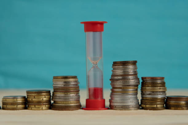 Coins Scattered in Water Reflections, A Medley of Currency Partially Submerged