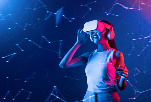 istock Female wearing VR headset looking virtual object holding goggles. Hallucination. 2166944985