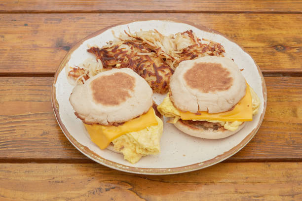 English Muffin sandwich served with eggs and cheese with hash browns