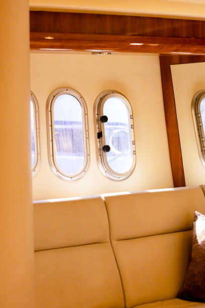 istock Luxury yacht sitting area in bedrom with leather sofa, background with copy space 2166947273