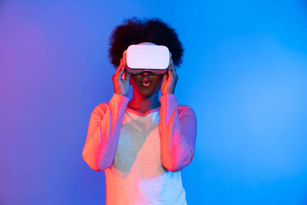 istock Profile thinking beautiful African wearing VR glasses metaverse. Contrivance. 2166949641