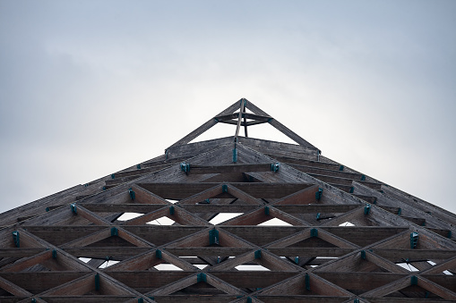 Triangular Timber Structure An Intricate Wooden Framework With Triangular Beams Showcases ...