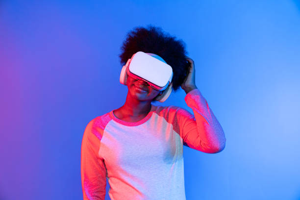istock Profile thinking beautiful African wearing VR glasses metaverse. Contrivance. 2166951754