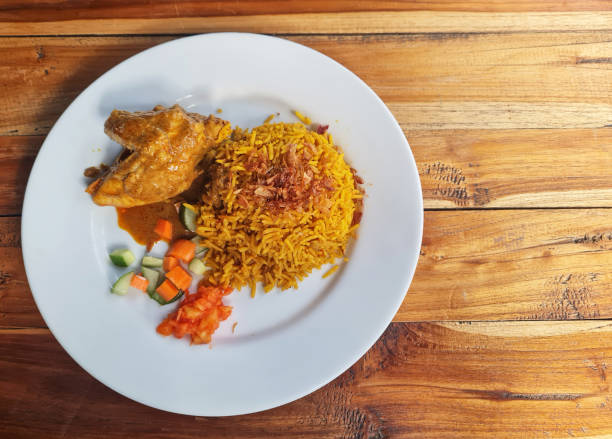 istock Nasi Kebuli with  Kari Ayam or chicken curry. 2166954146