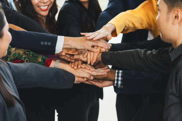 istock Diversity business people putting their hands together. Assemble. Intellectual. 2166954152