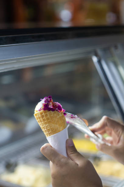 istock Put ice cream in to a cone 2166957147