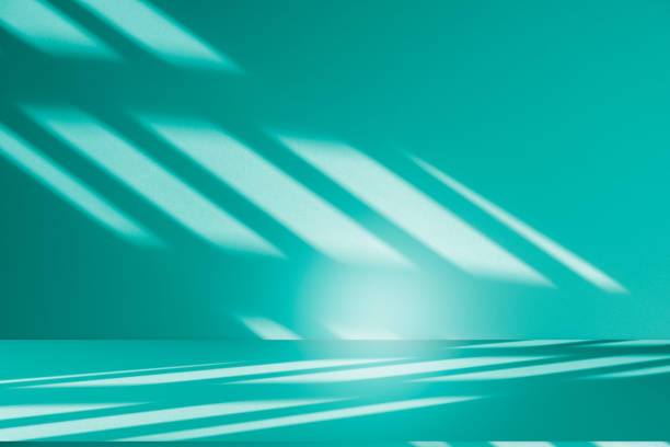 istock Studio style background wall decoration presentation uses white and green tones. with shadows cast from a nearby window, concept creating a decorative 2166958941