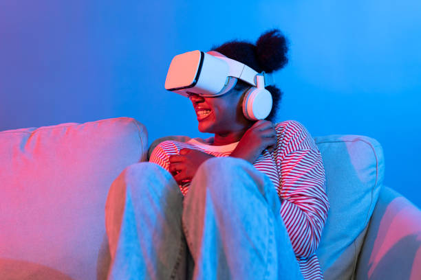 istock Young African watching scary movie through VR feeling scared. Contrivance. 2166961739