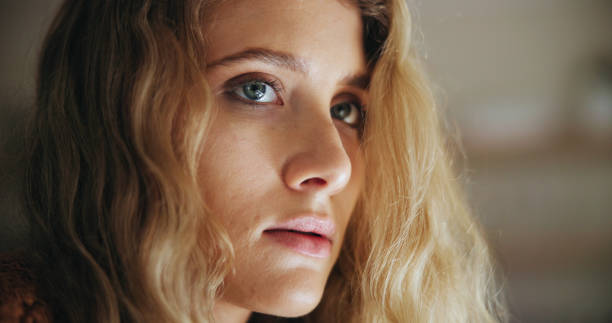 istock Sad, woman and thinking with depression in home for flashback, grief and dissociation in memory. Mental health, banner and person with thoughts of psychological trauma, anxiety and ptsd in house 2166963005