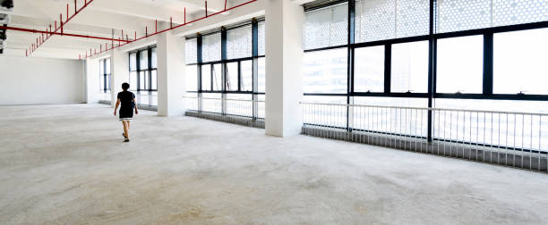 istock Woman walking in new office building 2166963739