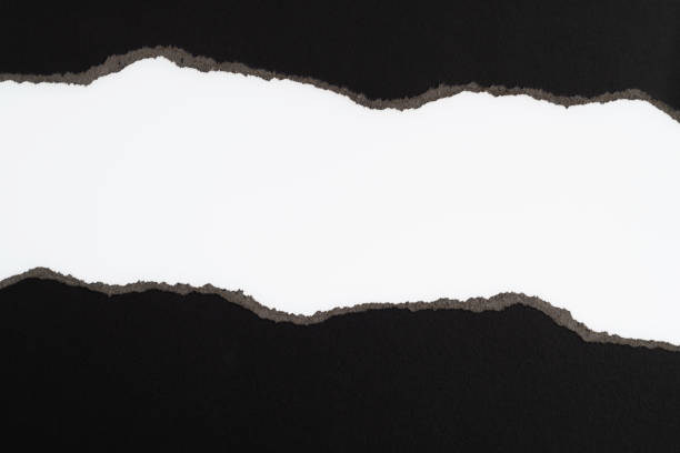 istock Background of torn black paper 2166963862