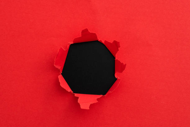 istock Red paper with a round hole 2166963864