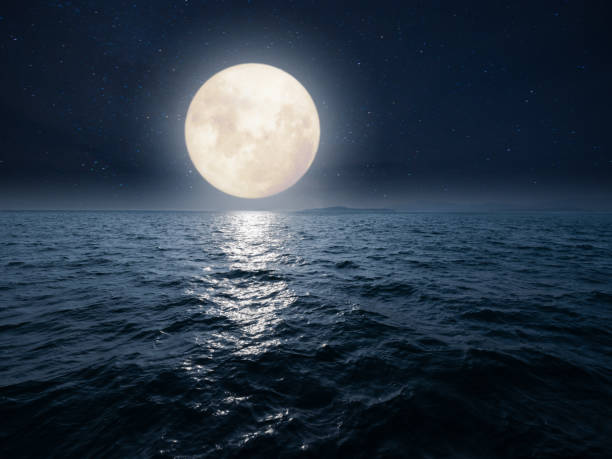 istock Fantasy image of fullmoon over sea 2166965551