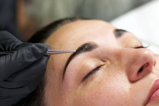 istock Eyebrow Shaping with Tweezers 2166967963
