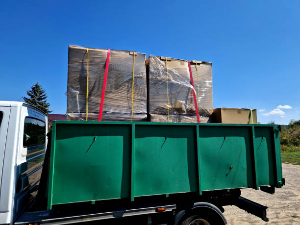 istock container loaded paper cardboard box. transportation to the truck is fixed by straps with pull-down. Customs officials weigh excess cargo, weight 2166969620