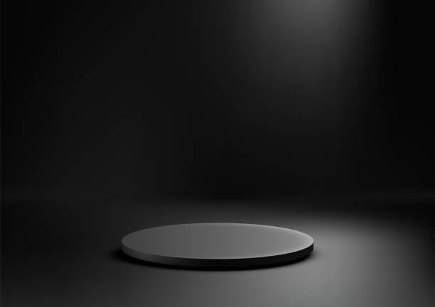 istock 3D Black Circular Podium in Spotlight with Dark Background for Minimalist Product Display and Elegant Mockup, Ideal for Showroom 2166970609