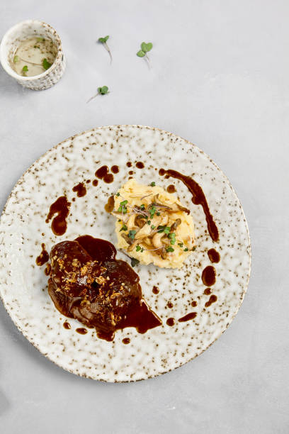 istock Gourmet Mashed Potatoes with Beef Cheeks in Demi-Glace Sauce 2166974109