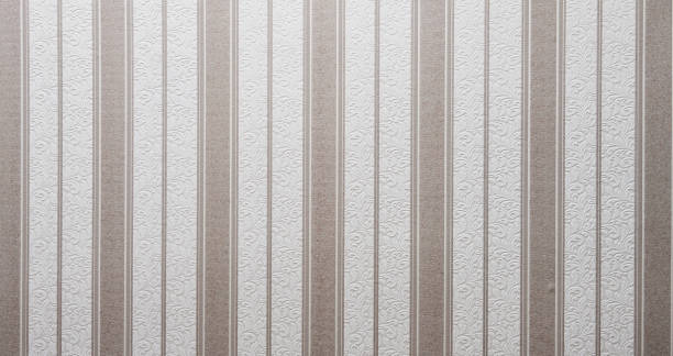 istock Old wallpaper on the wall. Old wallpaper for texture or background. 2166977542