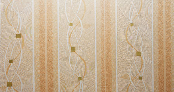 istock Old wallpaper on the wall. Old wallpaper for texture or background. 2166977636