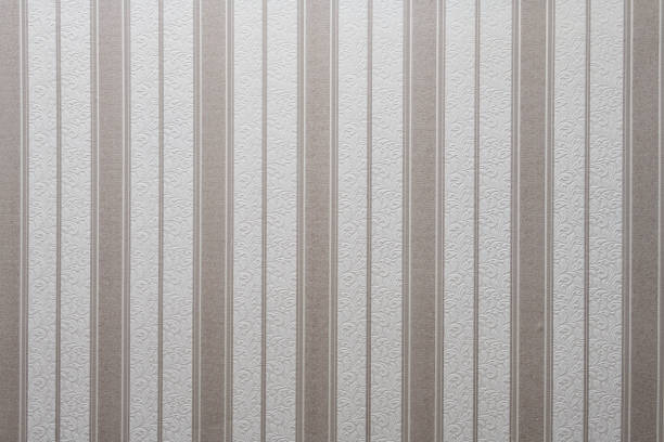 istock Old wallpaper on the wall. Old wallpaper for texture or background. 2166977974
