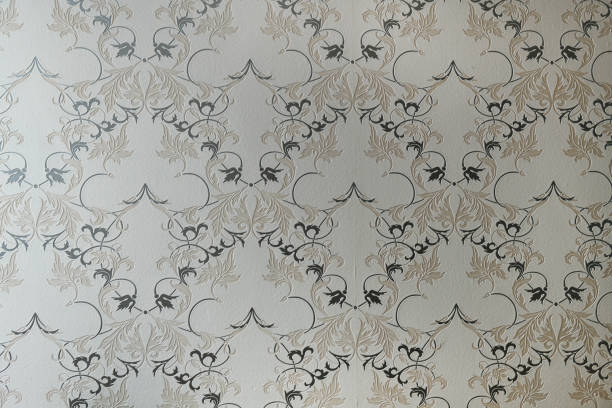 istock Old wallpaper on the wall. Old wallpaper for texture or background. 2166978174