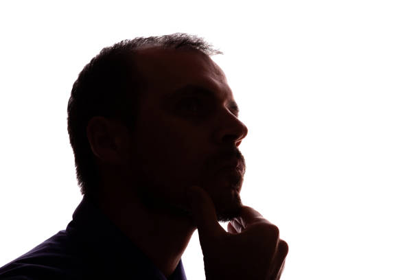 istock Thoughtful young unshaven man, business clothes, silhouette - white background isolate 2166981890