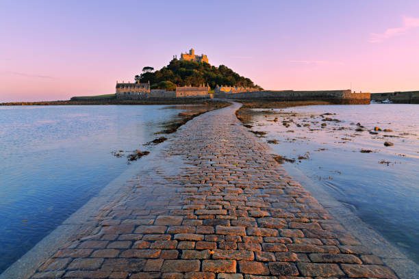 Mount Saint Michael at the sunset with sand ripples in Penzance, United Kingdom.