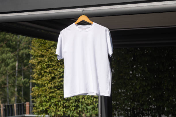 istock White T-shirt hanging on a hanger, layout 2166984257