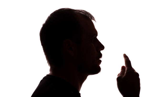 Confident young unshaven man businessman business clothes silhouette showing thumbs up - on white background isolate