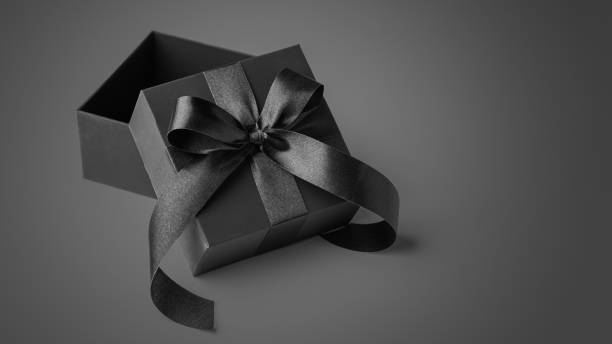 istock Opened black gift box with bow, black friday sale background 2166988701