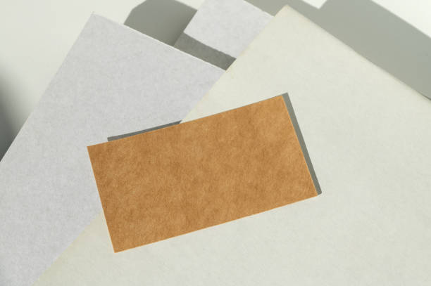 istock Minimalist Paper Layers with Natural Sunlight and Shadow Play 2166991194
